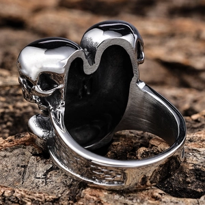 Gothic dual skull ring in stainless steel with a vintage punk aesthetic finish