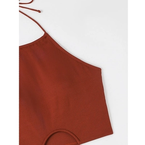Detail of ribbed knit halter bikini top in caramel with waist cutout and tie design