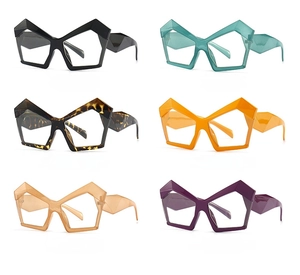 Detail of polygonal cat-eye glasses frames in multiple colors with faceted temples