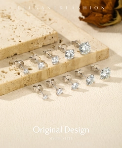 Detailed view of S925 sterling silver moissanite stud earrings with hallmark engraving