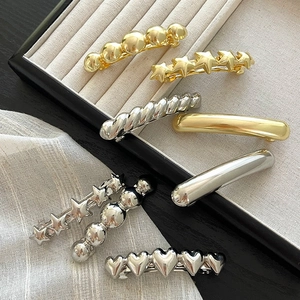 Set di fermagli per capelli minimalisti oro e argento in varie forme geometriche e cuori