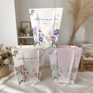 Trapezoid floral gift bags with ribbon handles and window for flower bouquets
