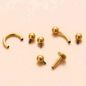 Golden titanium flat back labret studs and replacement balls body piercing jewelry set