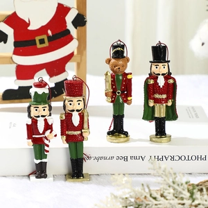 Set of 4 Christmas resin nutcracker soldier ornaments in red, green and gold colors