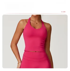 Detail of deep pink yoga vest featuring a U-shaped neckline and moisture-wicking fabric