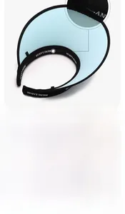Detail view of the detachable windproof rope and adjustable hook on a sun visor hat
