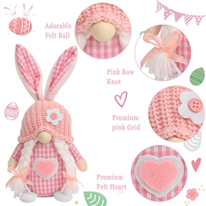 Detail view of pink Easter gnome with bunny ears, plaid fabric, and felt heart accents