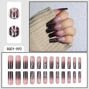Halloween gradient purple press-on nails with spider web patterns and heart line designs