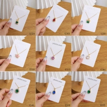 Collage of emerald Buddha necklaces with colorful gemstones on gold chains