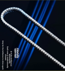 Macro view of D-F grade Moissanite stones on a luxury tennis chain with silver finish