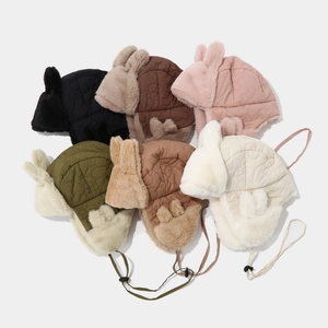 Colección de gorros de invierno tipo ushanka de felpa para niños con orejas de conejo.