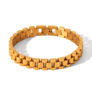 Detailed close-up of golden stainless steel triple-link watch-style bracelet chain