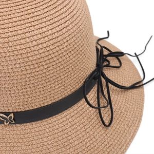 Straw sun hat with black leather strap and gold metal butterfly charm detail