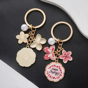 Pink butterfly and floral pendant keychain with pearls for Mother's Day gift