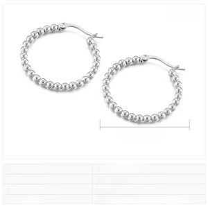 Detail view of 27x3mm stainless steel beaded hoop earrings with 5g weight specification