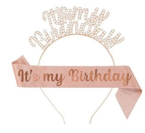 Close-up of pink glitter sash and rhinestone tiara with Its my Birthday text