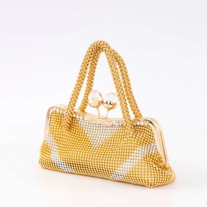 Elegant gold rhinestone clutch bag with crystal bead handles and sphere clasp on white background