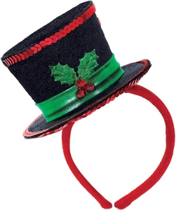 Detail of mini Christmas top hat headband with red sequins, green ribbon and bells