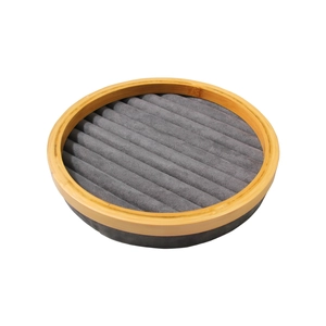 Round bamboo jewelry tray with grey velvet slots for rings and earrings display