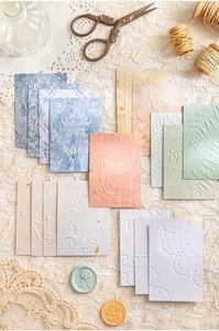 Macro shot of embossed vintage paper featuring floral patterns for scrapbooking