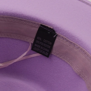 Detail of wool felt hat inner lining with adjustable drawstring and 65% cotton care label