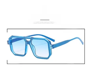 Detail close-up of retro square blue sunglasses with transparent frames and gradient lenses