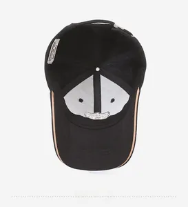 Detailed interior of black baseball cap showing six-panel canvas construction and sweatband
