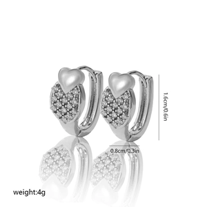 Silver heart earrings with cubic zirconia detail and size dimensions shown on white background