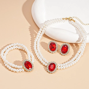 Elegant 3-piece faux pearl jewelry set with oval ruby pendants and sparkling crystals