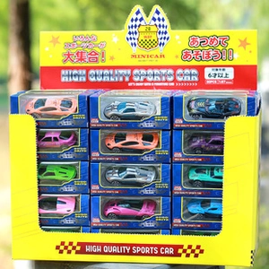 Bulk display of 60 miniature 1:87 scale simulation toy cars in a yellow display box