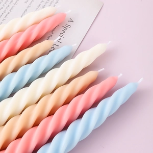 Spiral twisted soy wax scented candles in pastel pink, blue, cream, and orange colors