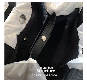 Detail view of white quilted bag interior with magnetic closure and zippered pocket