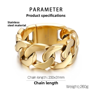 Macro view of 31mm chunky gold Cuban chain showing the 316L stainless steel engraving