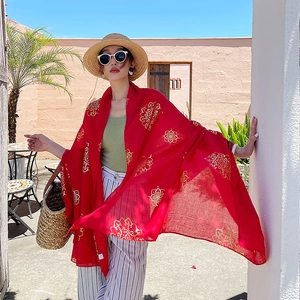 Red long silk scarf with gold mandala prints for beach sun protection and casual styling