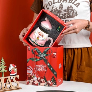 Detailed Christmas gift set with Santa ceramic mug and matching festive red gift box