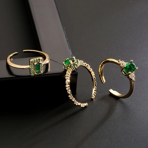 Three-piece gold plated open rings set with micro-paved green zircon geometric stones