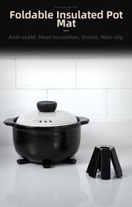 Foldable black heat-resistant mat showing open and compact storage states for pot protection