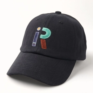 Detail of multi-color iR embroidery on black cotton baseball cap with twill texture