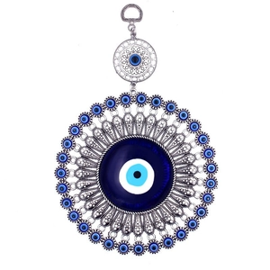 Blue Evil Eye metal wall decor with silver hollow floral patterns and glass eye charm