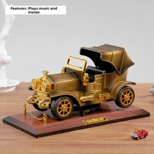 Detailed macro view of vintage bronze musical car model with classic metallic finish