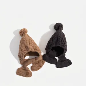 Winter knit hooded scarf hat for babies with thick cable knit and faux fur pom-poms