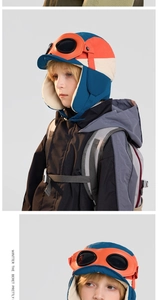 Close-up of kids winter pilot hat featuring fleece lining and goggles for cold weather