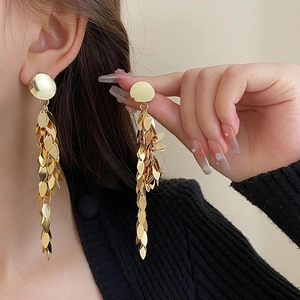 Elegant gold leaf tassel earrings for women with minimalist metallic leaf drops