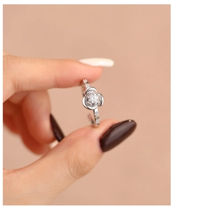 Close-up of S925 sterling silver rose ring with micro-set zircon and adjustable band