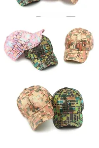 Three sequin baseball caps with geometric patterns in pink, black, gold and beige