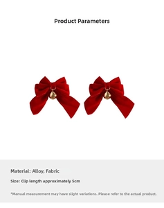 Detail of red bow hair clips with gold bells and velvet fabric on a clean white background