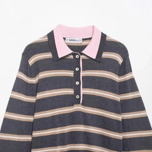 Women's long sleeve polo knit sweater featuring colorful horizontal stripes and pink collar