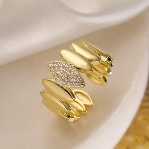 Minimalist 18K gold plated geometric ring with micro-pave zircons on satin background