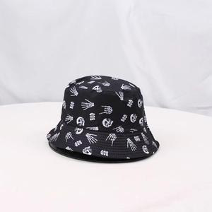 Outdoor sun protection bucket hat featuring Halloween skull and BOO prints