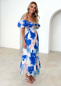 Detail of floral print maxi dress featuring off-shoulder puff sleeves and slim waist